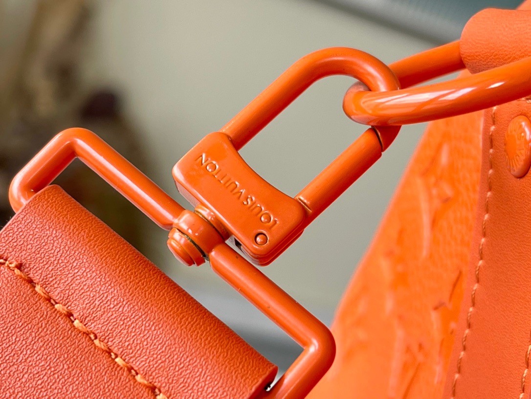 Louis Vuitton Keepall Bandouliere 25 Monogram Embossed Orange in